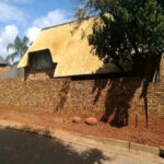 Fixing exposed wire mesh old thatch